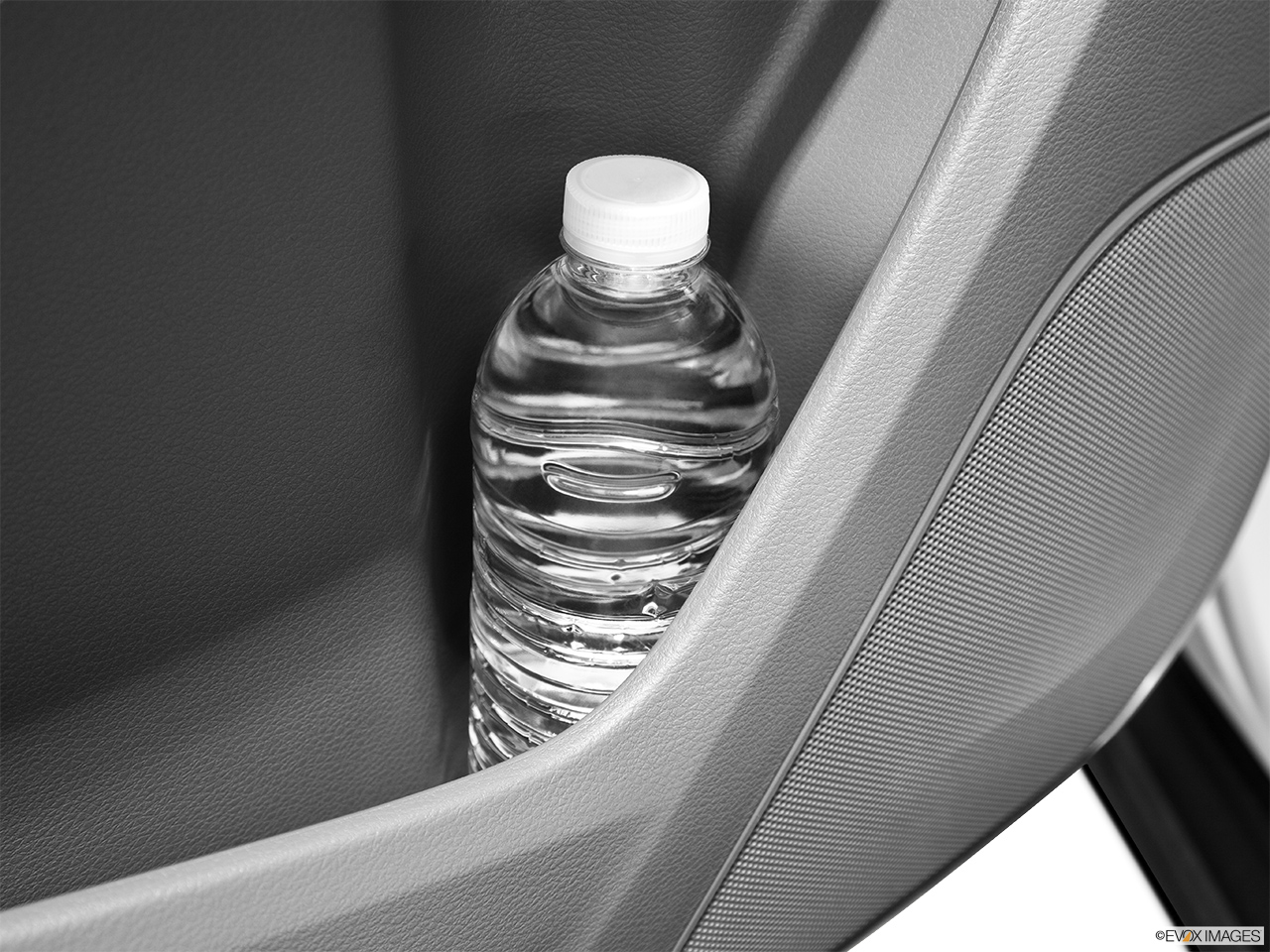 2014 Acura MDX SH-AWD Second row side cup holder with coffee prop, or second row door cup holder with water bottle. 