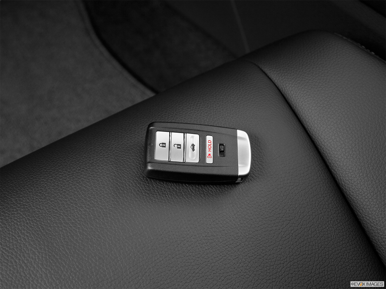 2014 Acura RLX Base Key fob on driver's seat. 