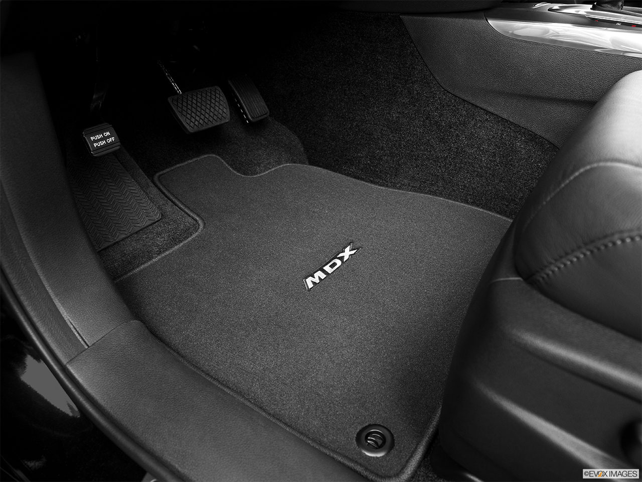 2014 Acura MDX Base Driver's floor mat and pedals. Mid-seat level from outside looking in. 