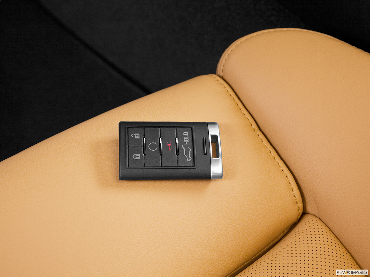 2014 Cadillac SRX Luxury Key fob on driver's seat. 