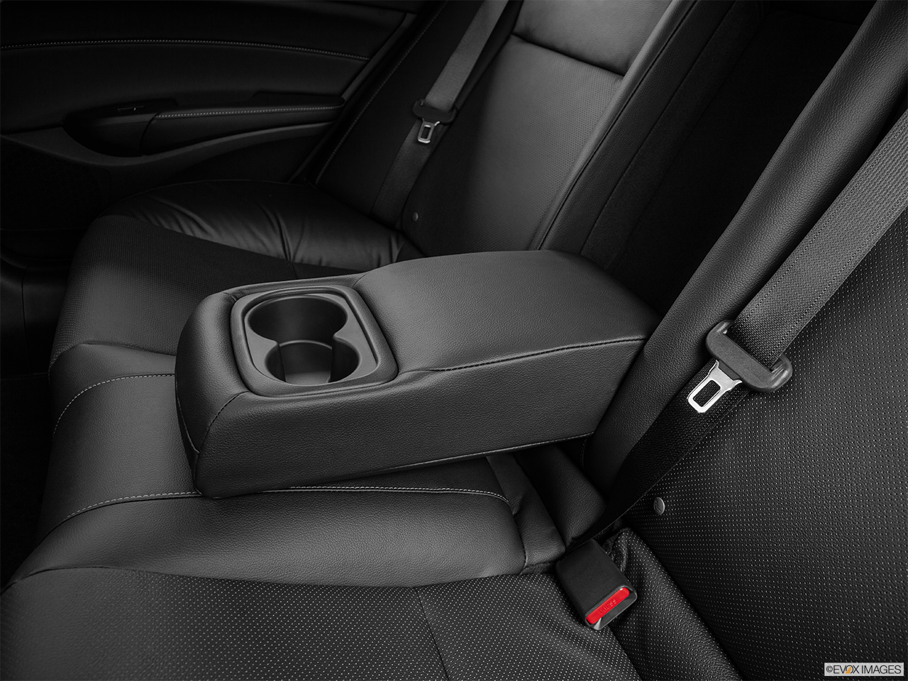 2015 Acura ILX 6-Speed Manual Rear center console with closed lid from driver's side looking down. 