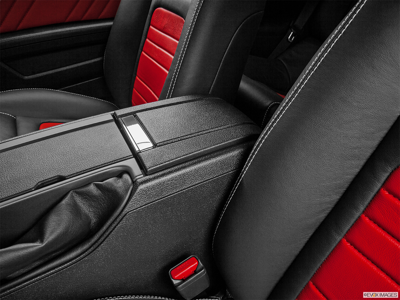 2014 Saleen George Follmer Mustang Base Front center console with closed lid, from driver's side looking down 