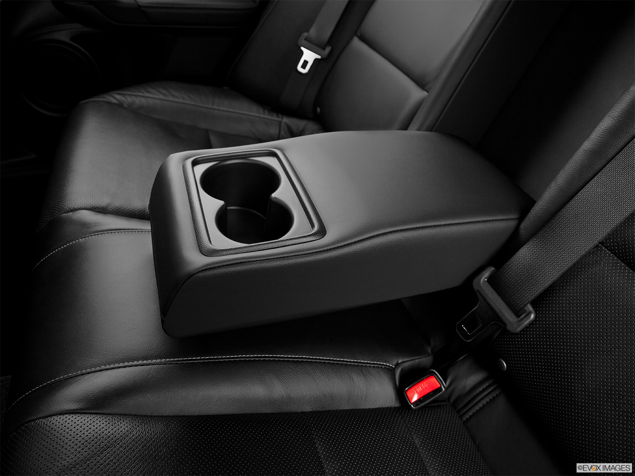2014 Acura TSX 5-speed Automatic Rear center console with closed lid from driver's side looking down. 