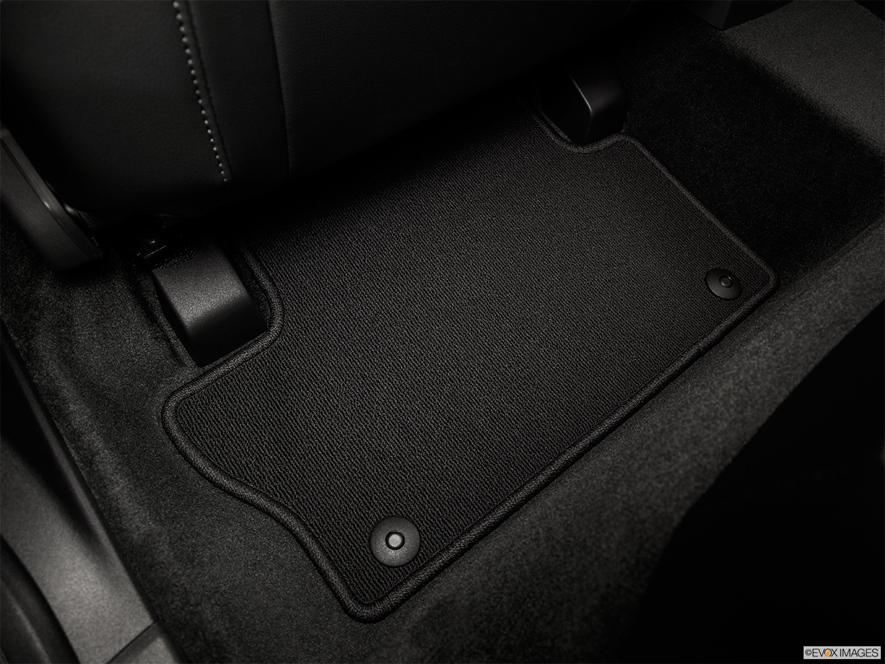 2015 Volvo XC60 Premier Rear driver's side floor mat. Mid-seat level from outside looking in. 