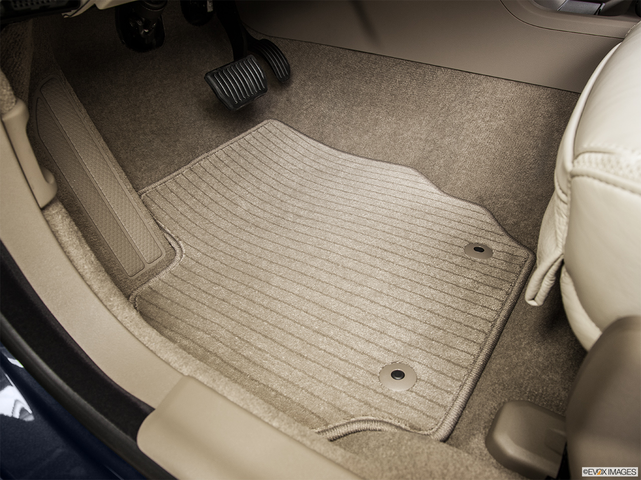 2015 Volvo XC70 Premier Plus Driver's floor mat and pedals. Mid-seat level from outside looking in. 
