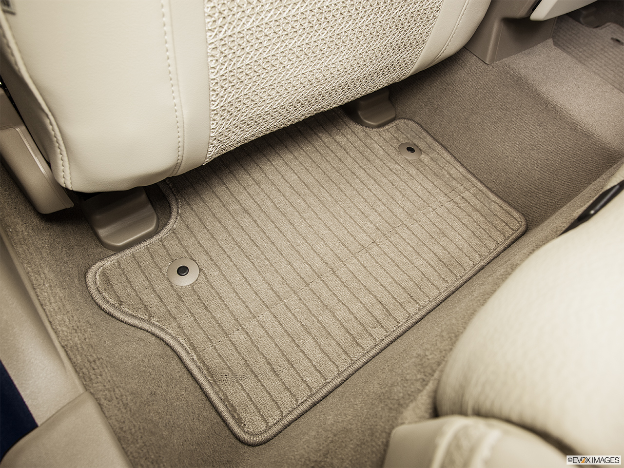 2015 Volvo XC70 Premier Plus Rear driver's side floor mat. Mid-seat level from outside looking in. 