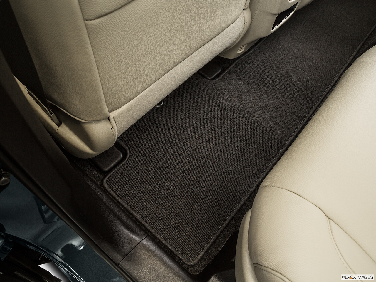 2016 Acura MDX Base Rear driver's side floor mat. Mid-seat level from outside looking in. 