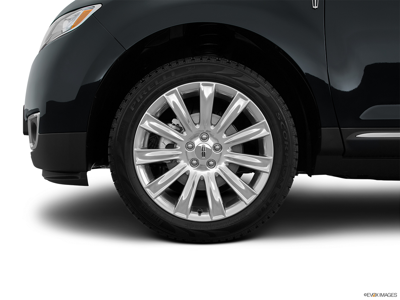 2015 Lincoln MKX FWD Front Drivers side wheel at profile. 